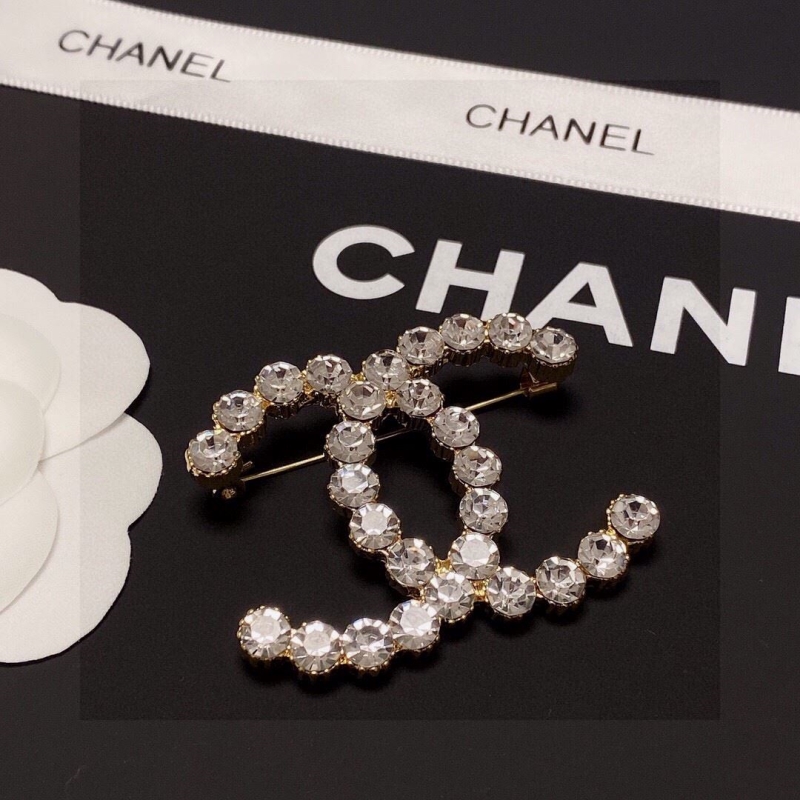 Ch*el brooches